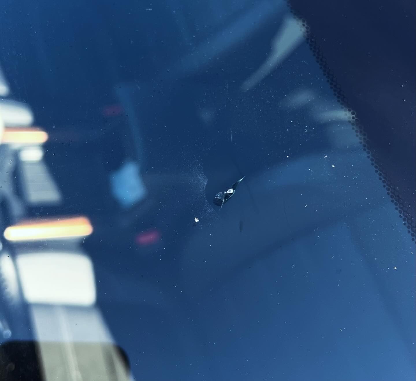 Windshield repair result — before